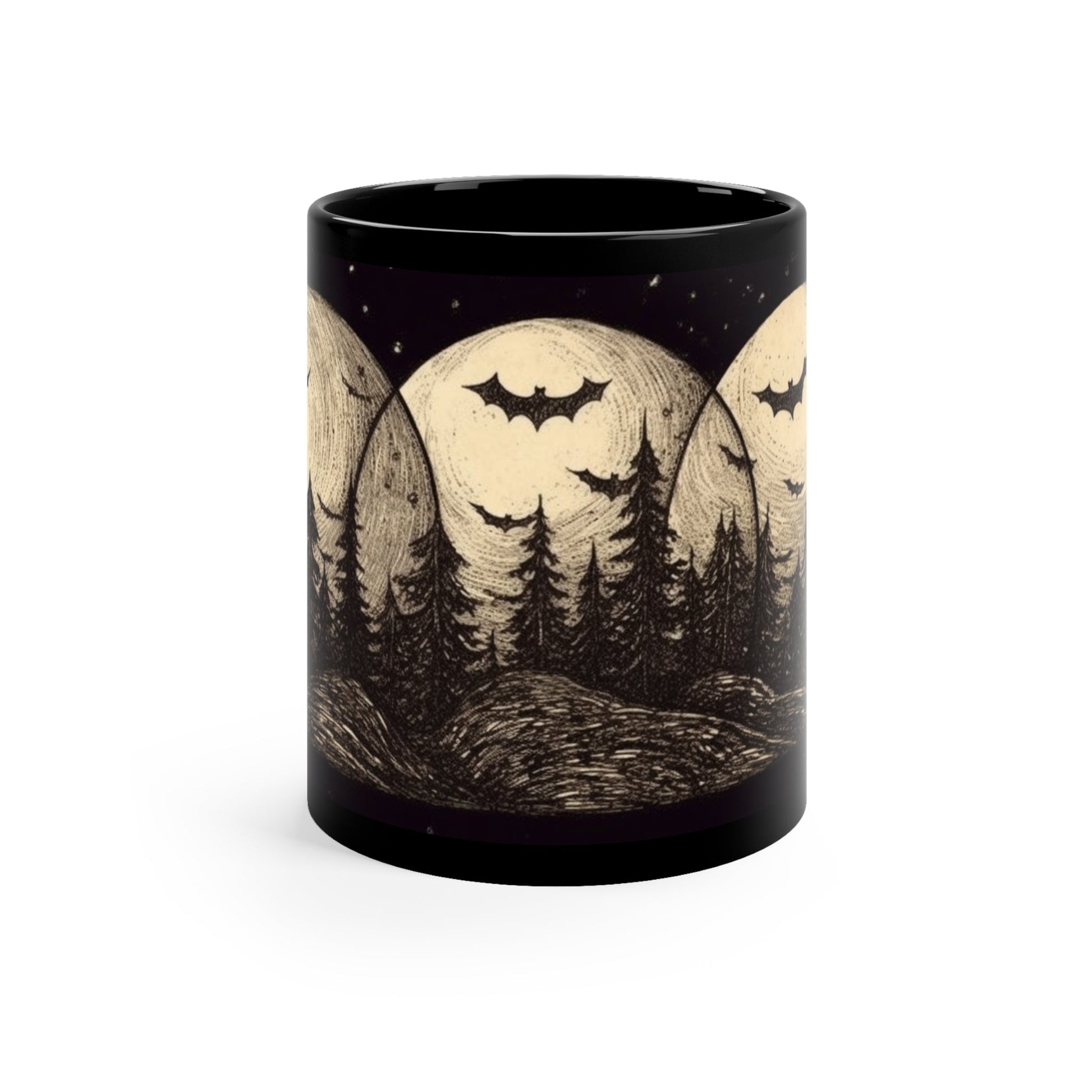 The front view of an alternative fashion black coffee mug with an image of bats flying in a forest at night in front of three moons.