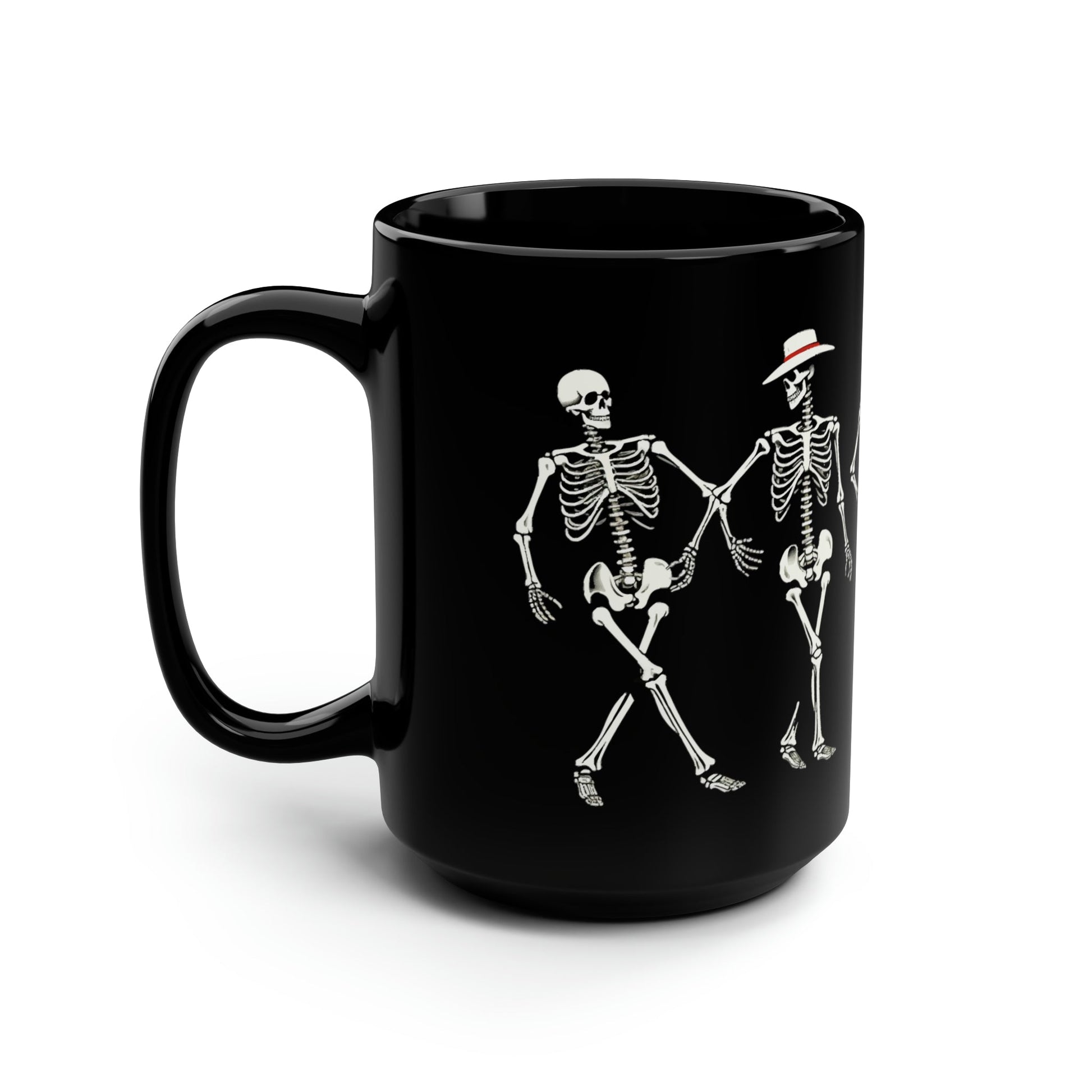 A side view of a black coffee mug with an image of dancing skeletons in hats printed on it.